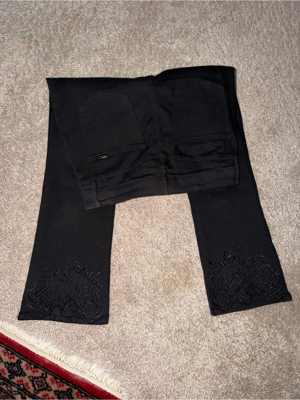 WHBM Black Flare Jeans with Embroidered Hem